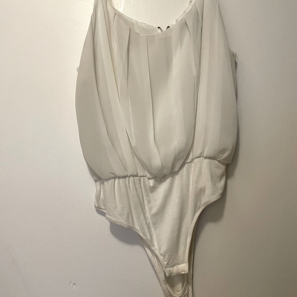 Beautiful white bodysuit with gold zipper